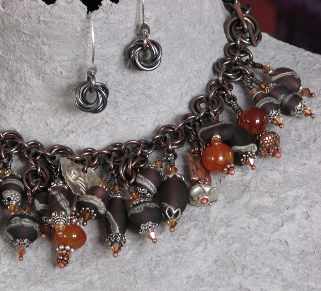 Bracelets/candy_wall_mobius_copper_lampwork_bracelet_amethyst_3.jpg